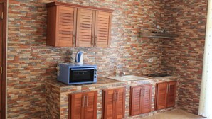 Suite Deluxe, 1 chambre, coin cuisine | Coin cuisine privé