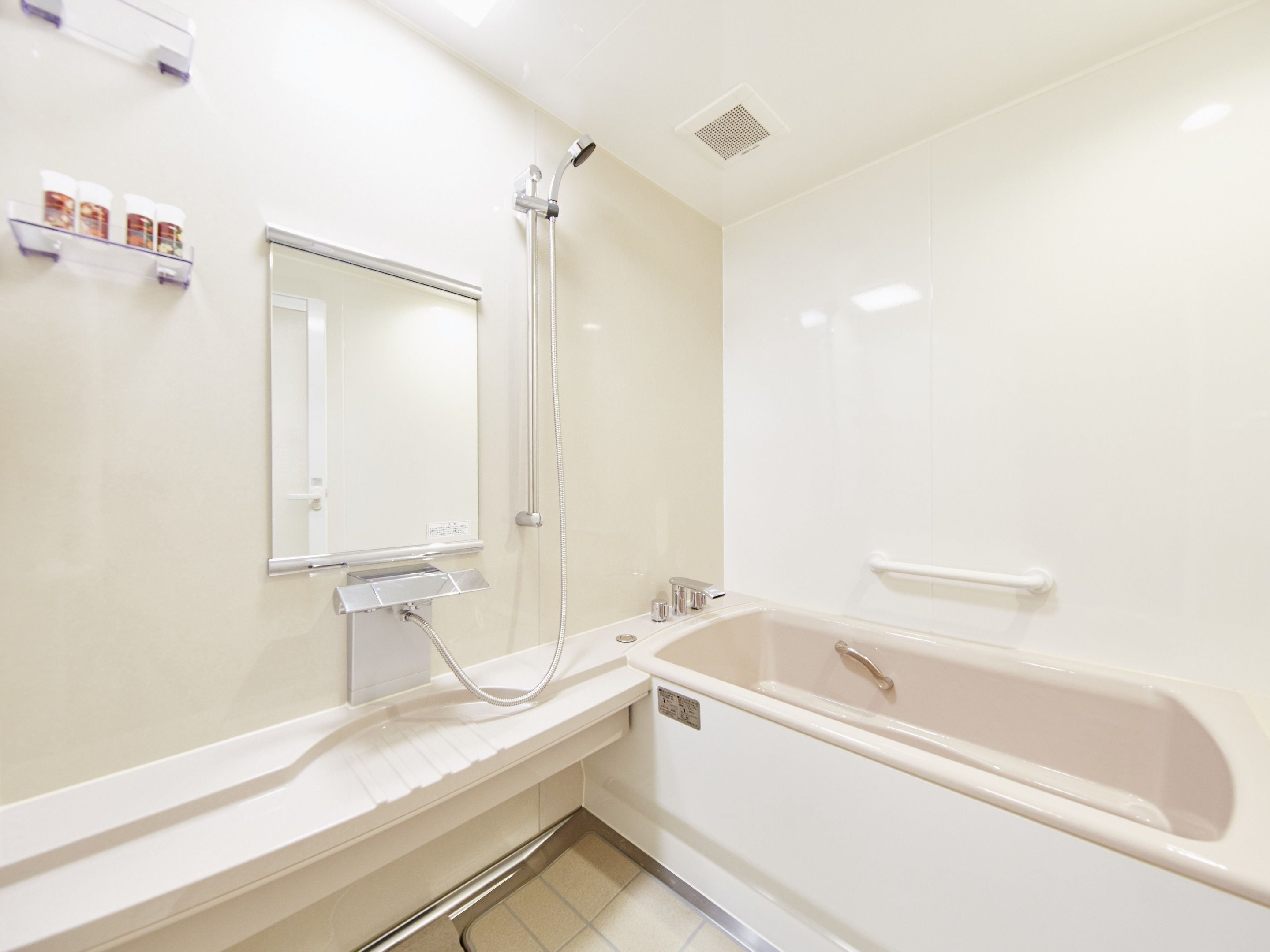 separate bathtub and shower, deep-soaking bathtub, hair dryer, slippers