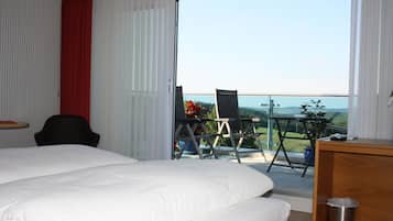 Comfort Triple Room, Balcony | In-room safe, desk, soundproofing, free cribs/infant beds