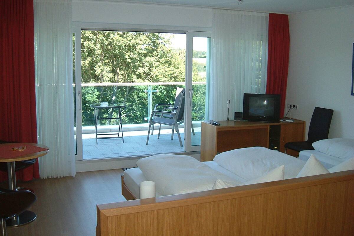 comfort triple room, balcony | in-room safe, desk, soundproofing, free cots/infant beds