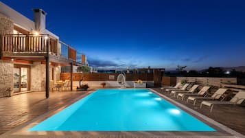 Seasonal outdoor pool, pool umbrellas, pool loungers
