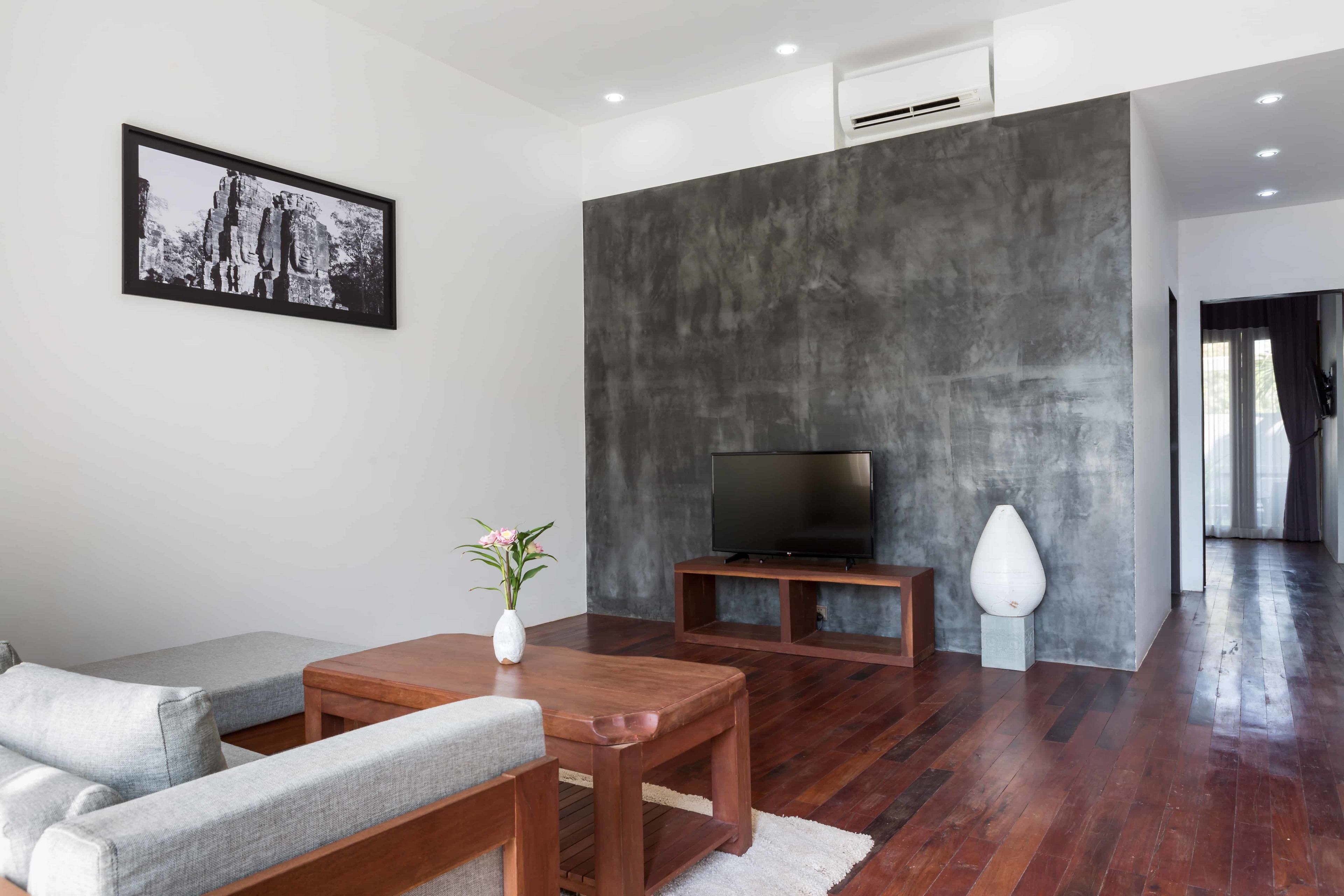 deluxe double suite with private garden - unlimited free airport & downtown transfer | living area | 42-inch flat-screen tv with cable channels, tv, netflix