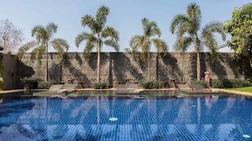 Outdoor pool, open 7:00 AM to 9:30 PM, pool umbrellas, sun loungers