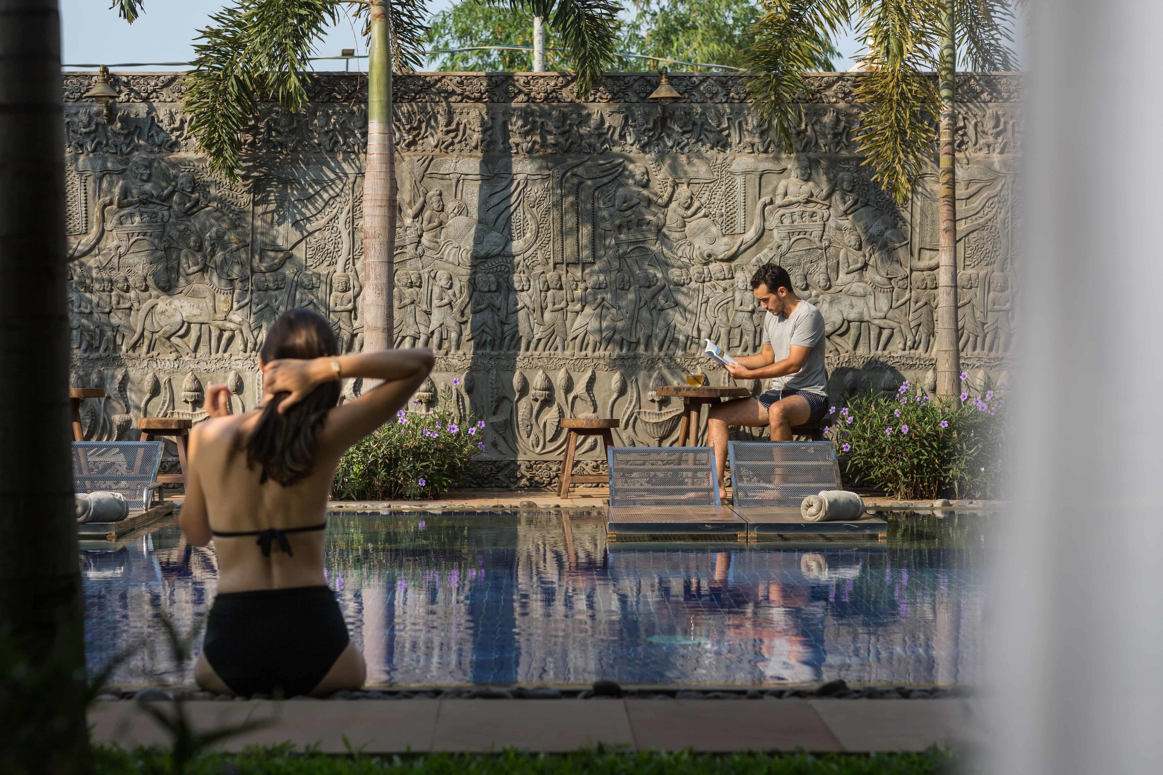 outdoor pool, open 7:00 am to 9:30 pm, pool umbrellas, pool loungers