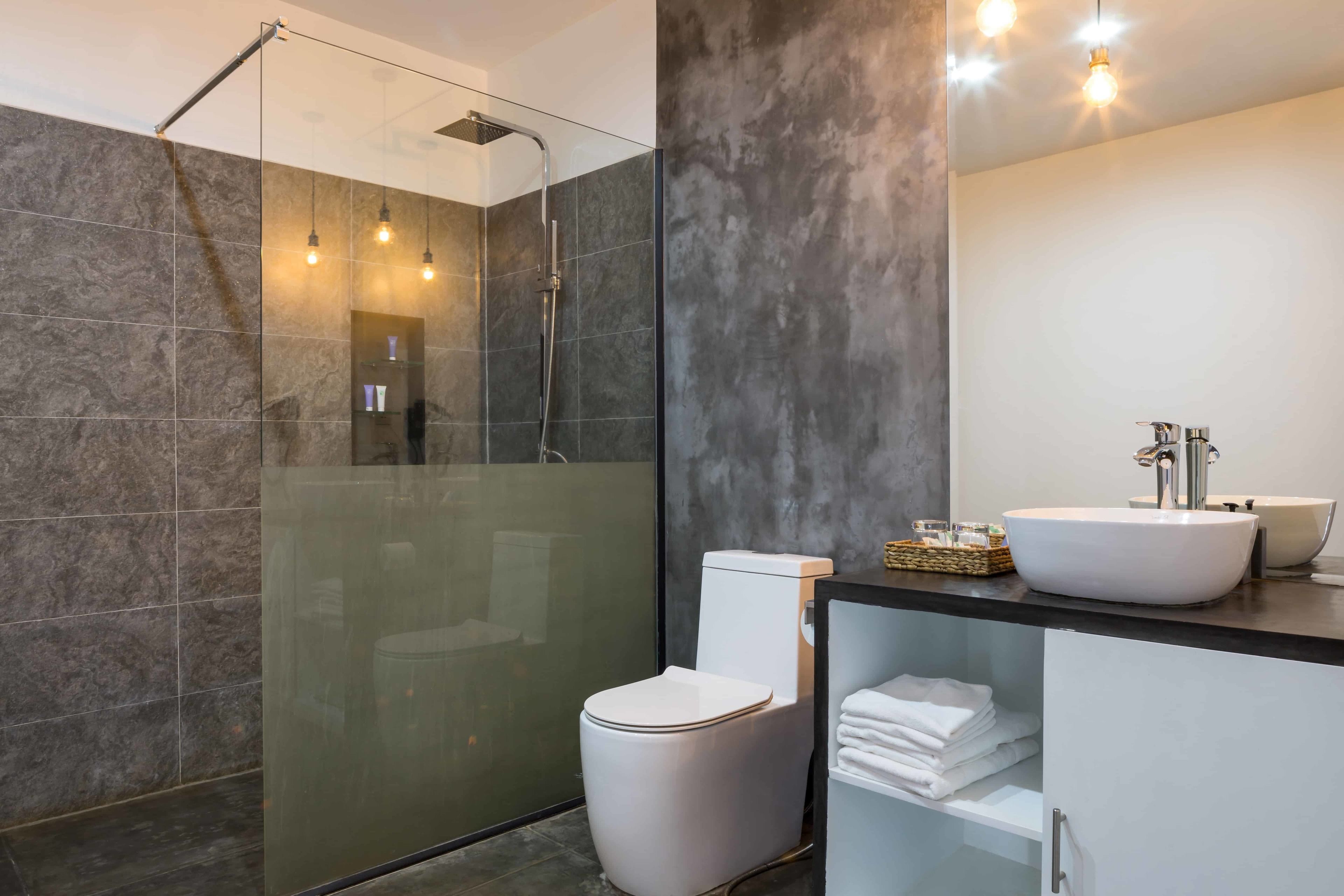 deluxe family suite with private garden - unlimited free airport & downtown transfer | bathroom | separate bathtub and shower, deep-soaking bathtub, rainfall showerhead