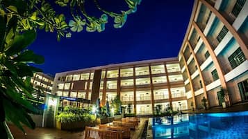 Outdoor pool, open 7 AM to 6 PM, pool umbrellas, pool loungers