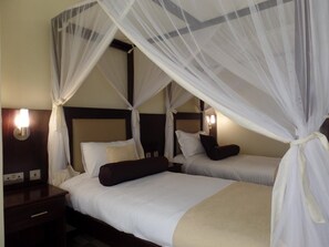 Egyptian cotton sheets, premium bedding, down comforters, in-room safe - Villa Leone (Nairobi)