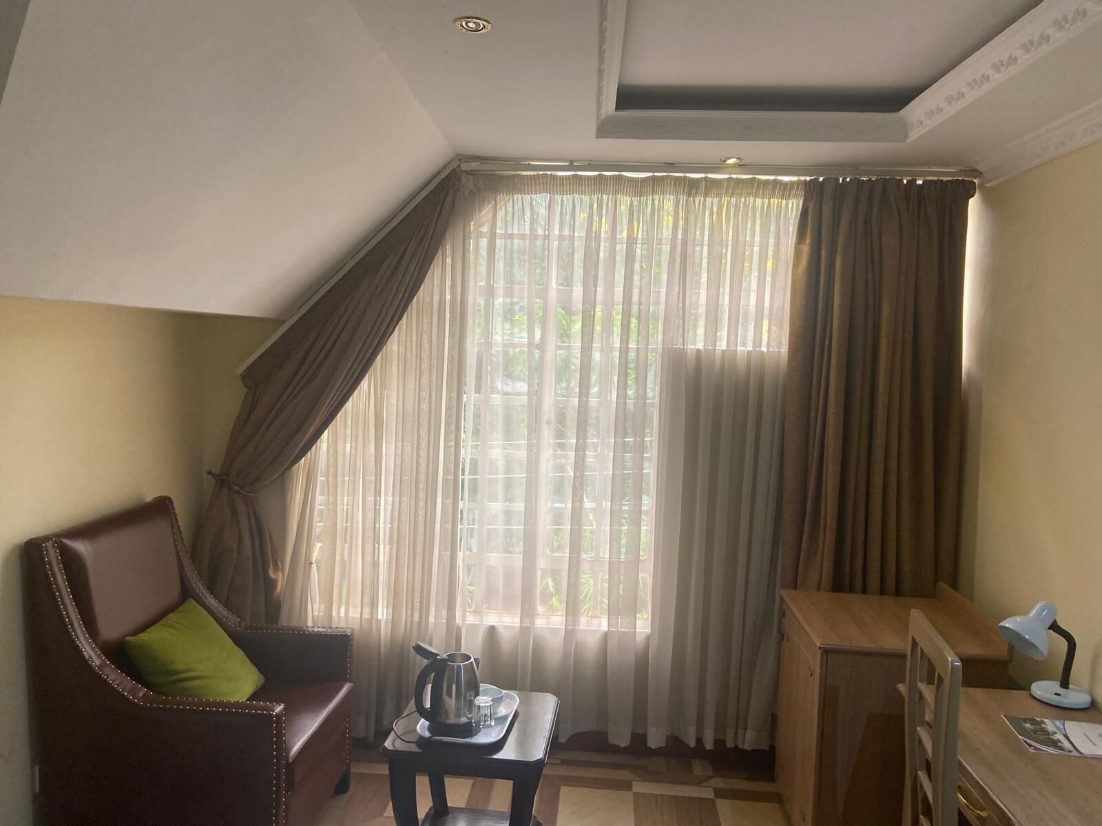 Standard Double Room | Living area | 32-inch plasma TV with cable channels, TV