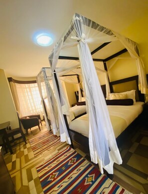 Egyptian cotton sheets, premium bedding, down comforters, in-room safe - Villa Leone (Nairobi)