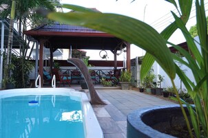 Outdoor pool, pool umbrellas, sun loungers
