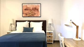 Deluxe Triple Room, 1 Bedroom, Non Smoking, Courtyard View | 7 bedrooms, desk, laptop workspace, blackout drapes