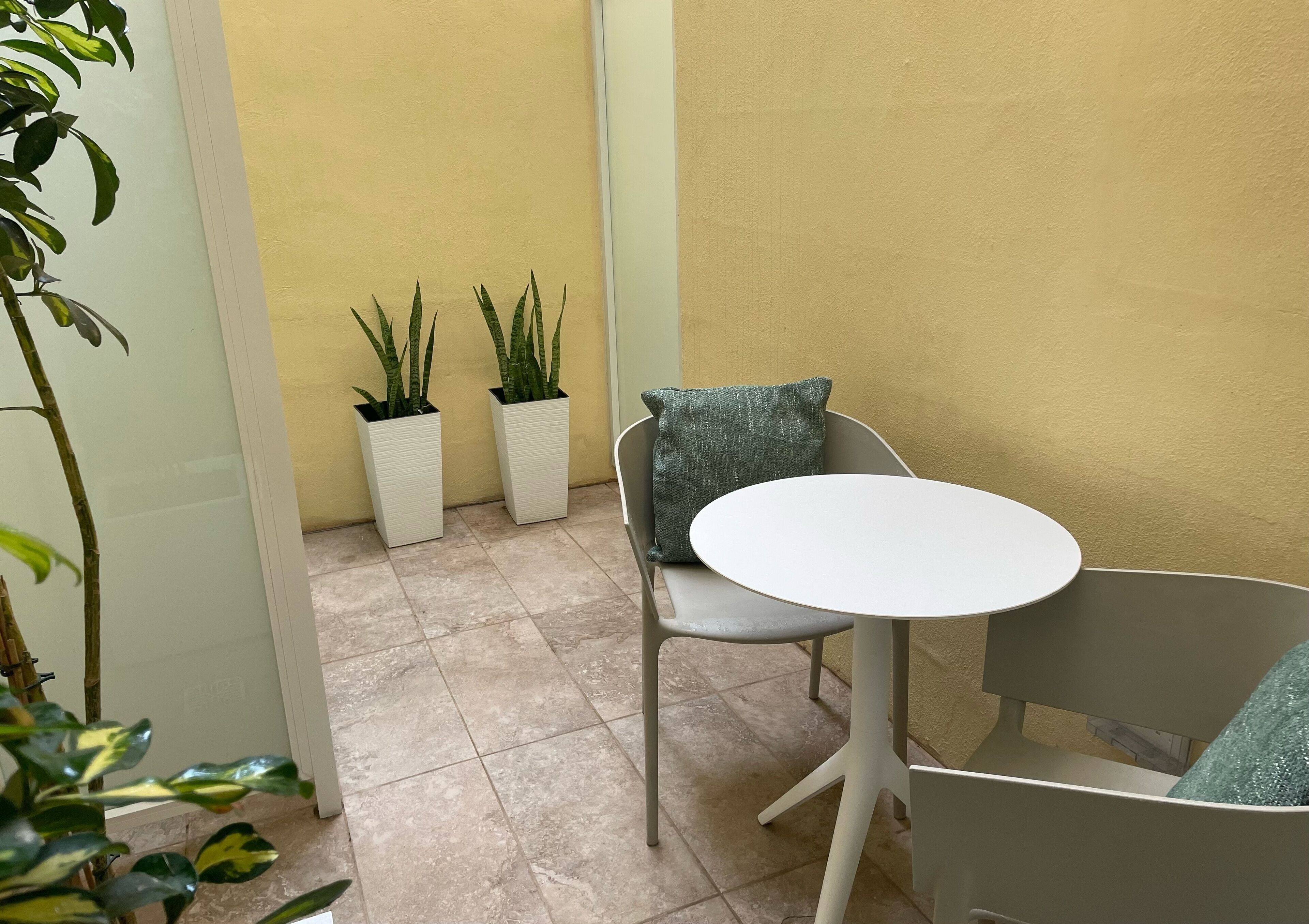 spa room with courtyard | terrace/patio