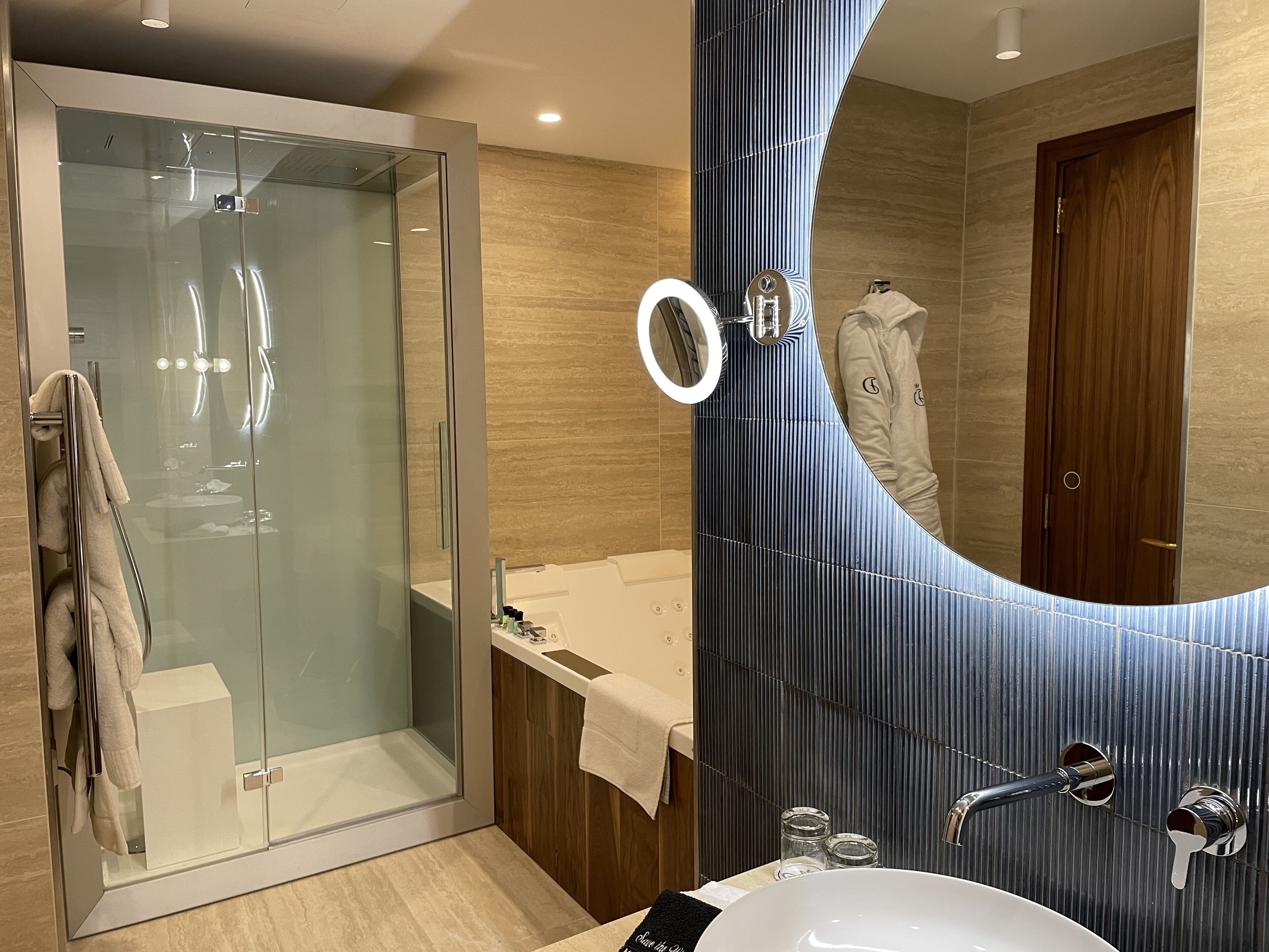 spa room with courtyard | bathroom | free toiletries, bathrobes, slippers, towels