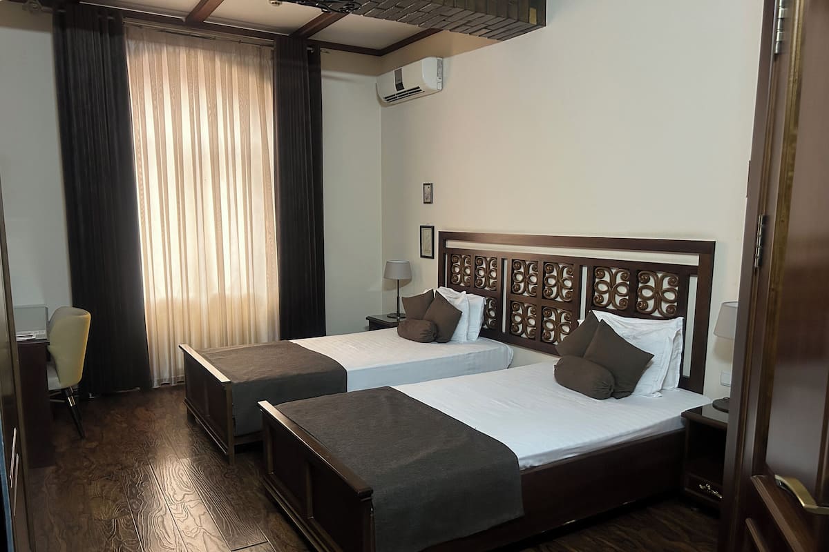 Standard Double or Twin Room | Down comforters, memory foam beds, minibar, in-room safe