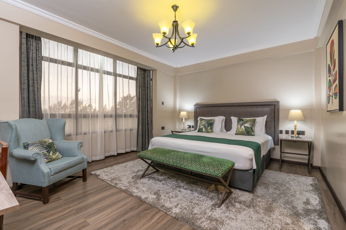 Premium bedding, down comforters, desk, laptop workspace