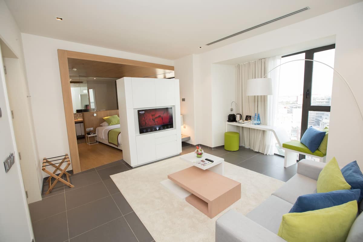 junior suite | 1 bedroom, premium bedding, pillow-top beds, in-room safe