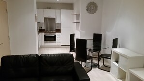 Premium Apartment, 1 Bedroom, Balcony, City View | Desk, iron/ironing board, free WiFi