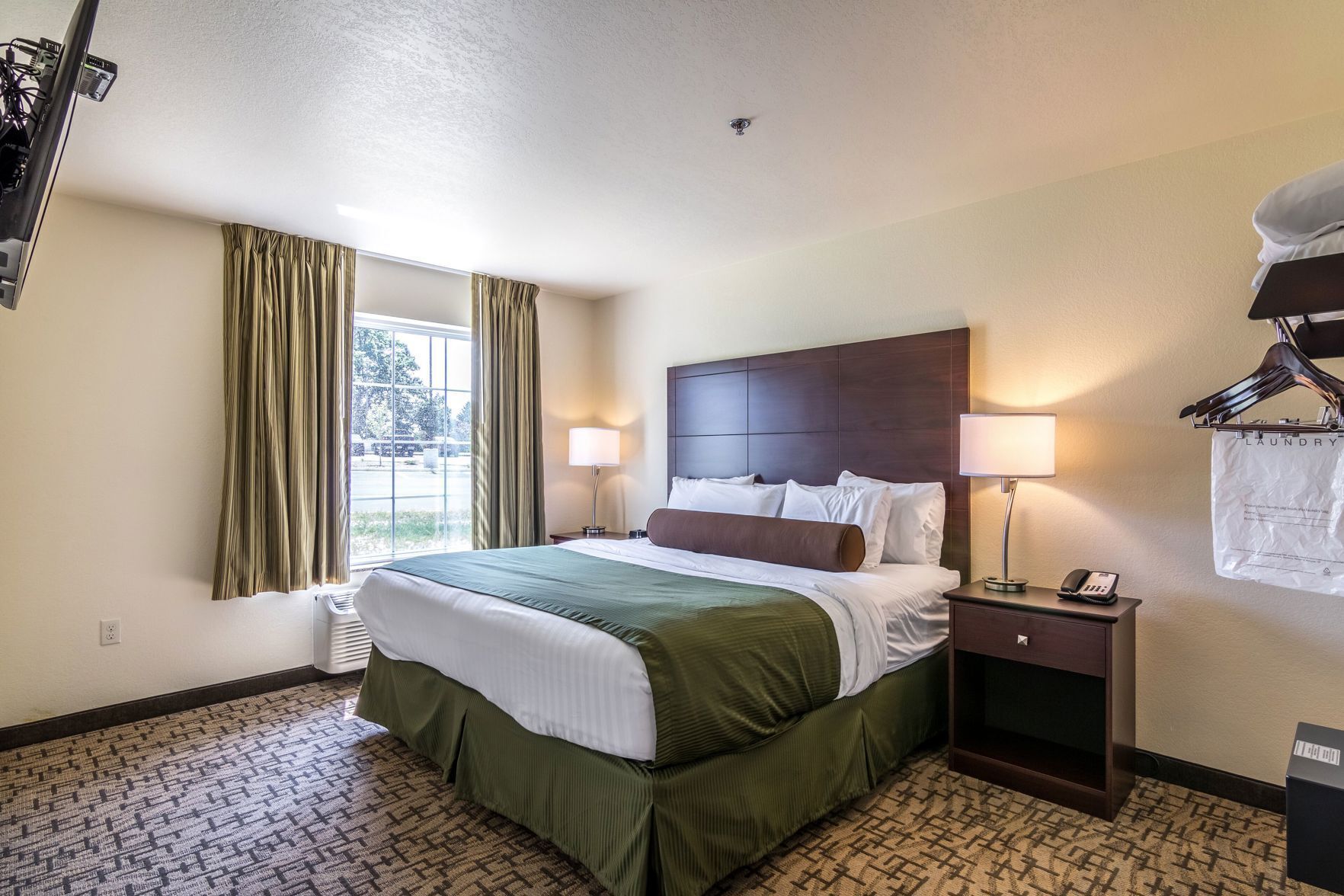 Premium bedding, down comforters, in-room safe, desk