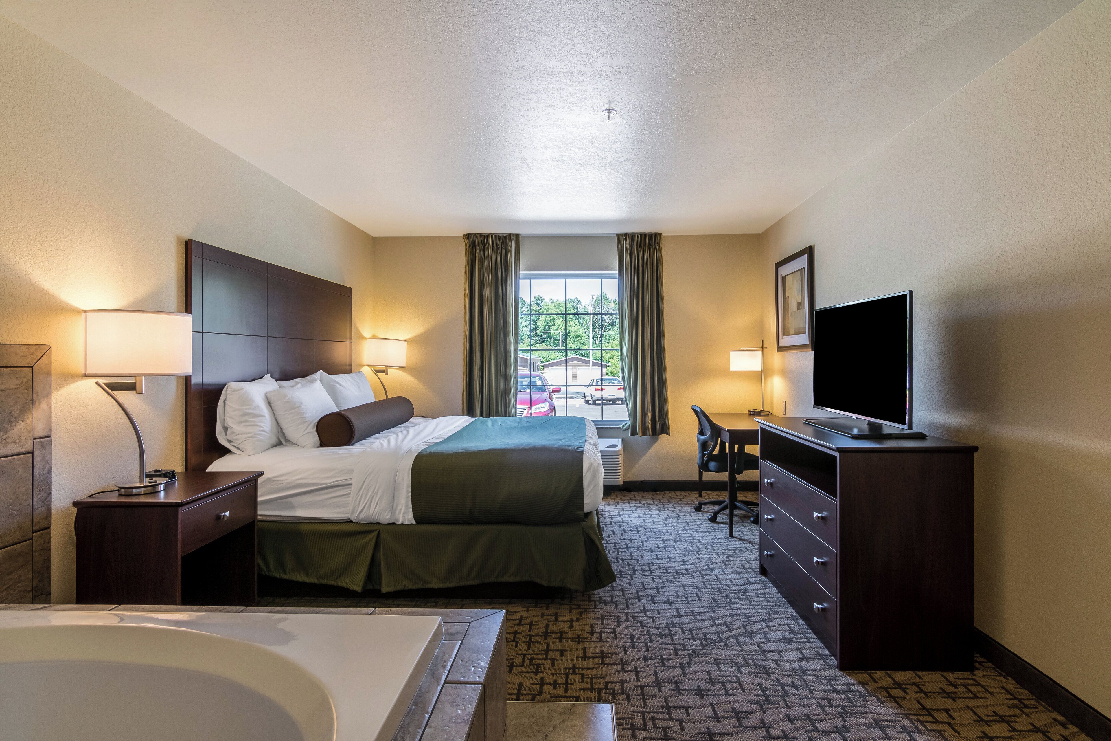 Premium bedding, down comforters, in-room safe, desk