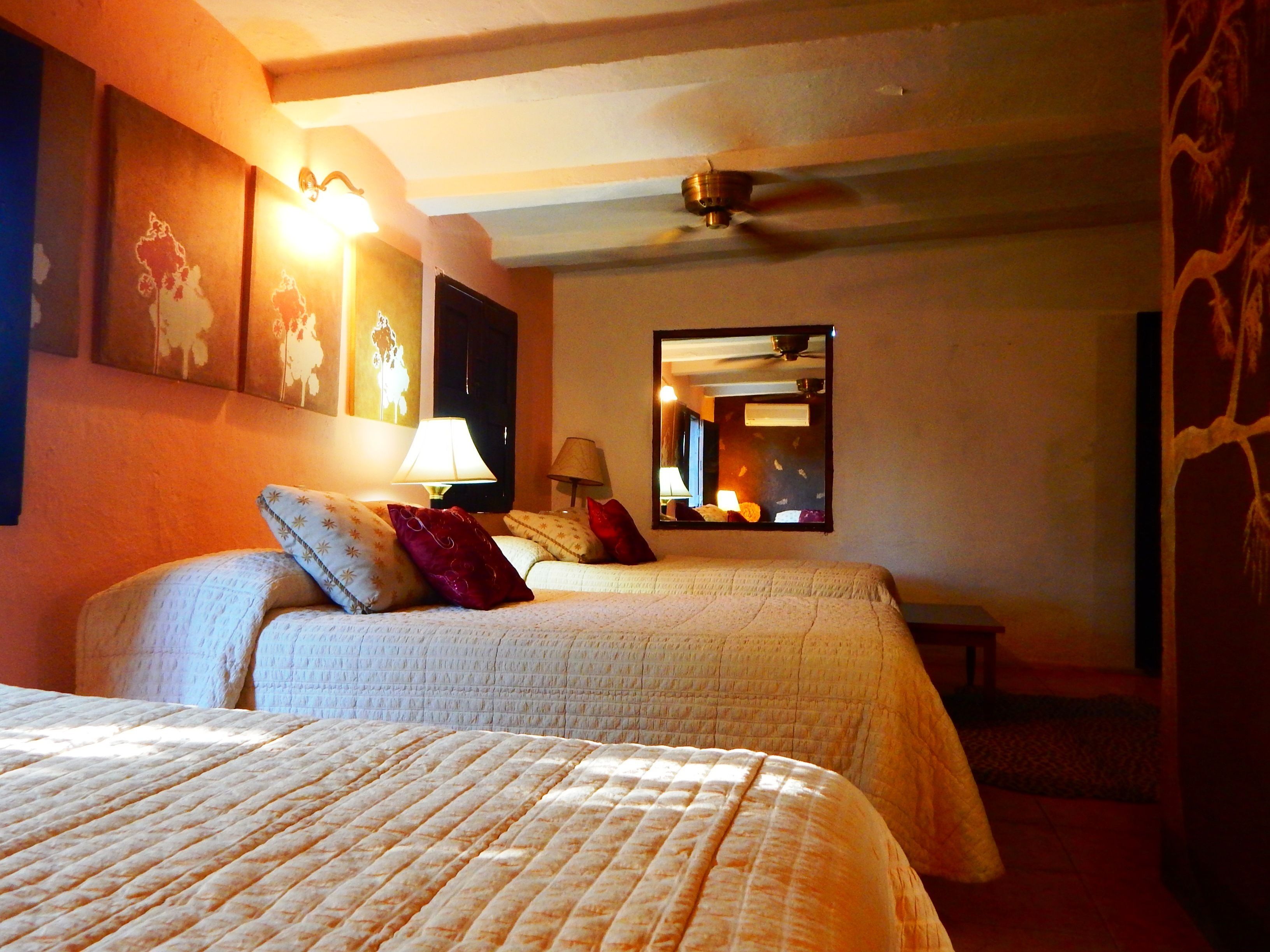 design triple room, multiple beds | 1 bedroom, bed sheets