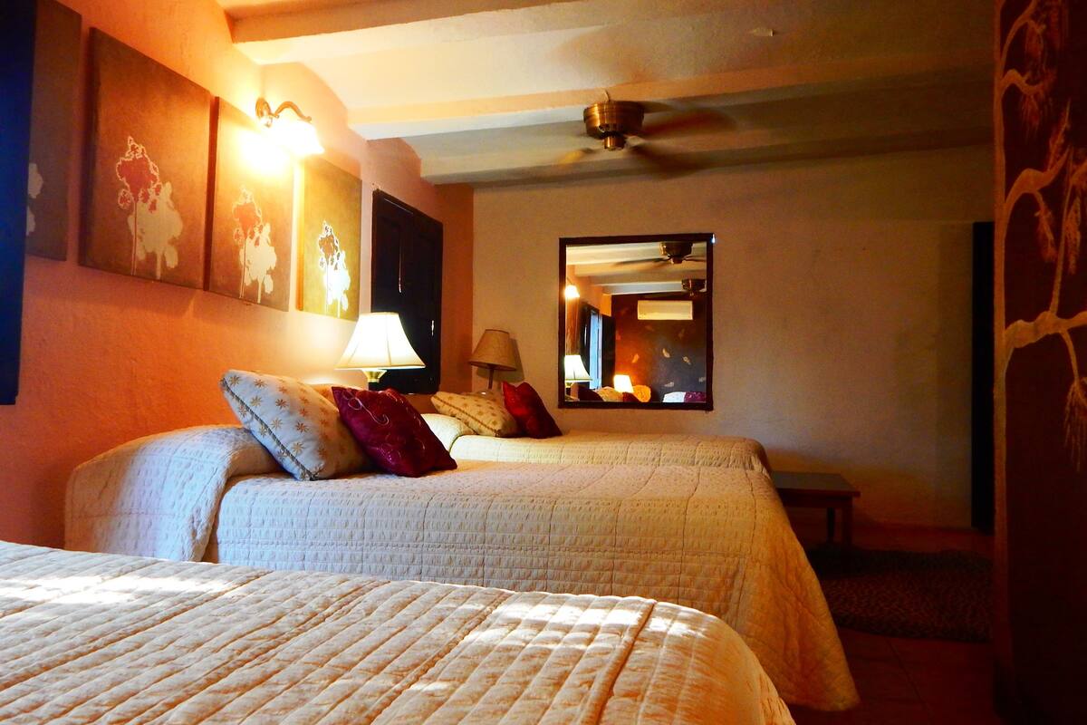 design triple room, multiple beds | 1 bedroom, bed sheets