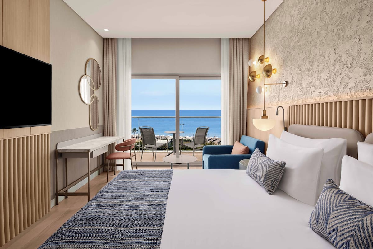 Family Room, Sea View (Superior) | Minibar, in-room safe, desk, iron/ironing board