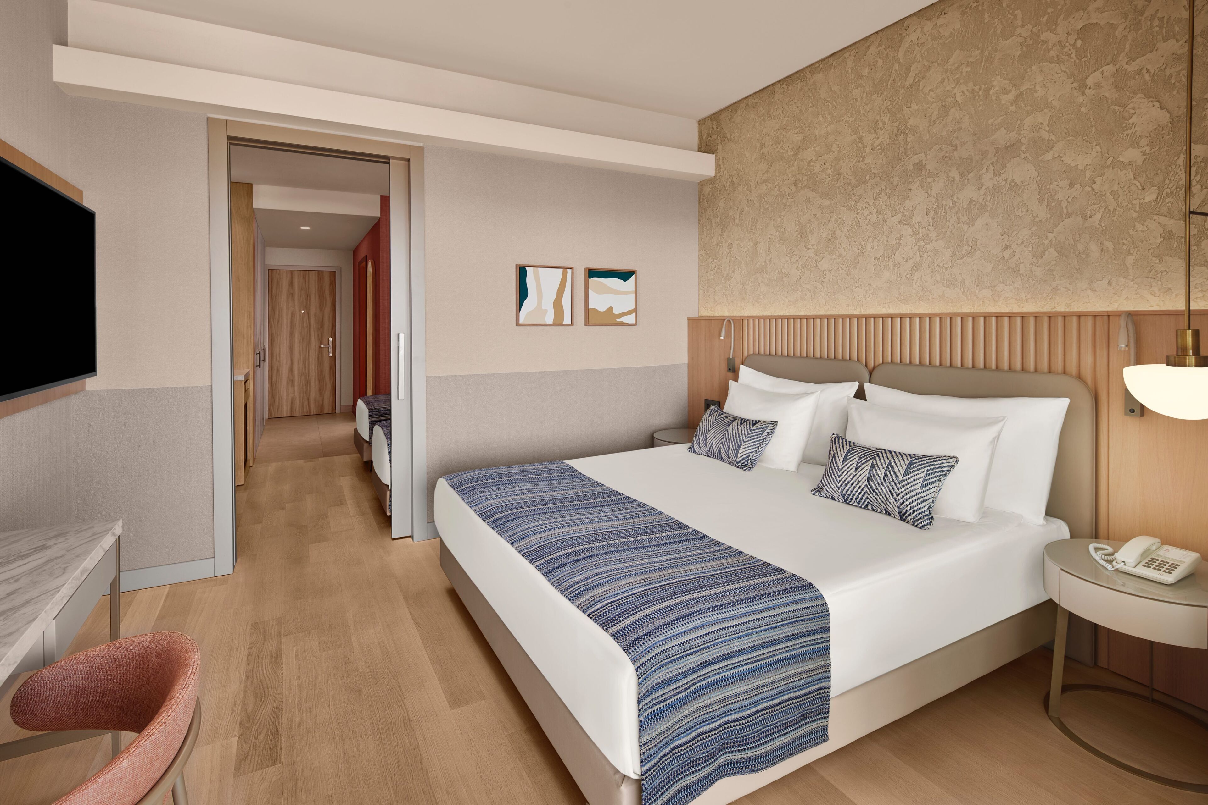 Family Room, Sea View | Minibar, in-room safe, desk, iron/ironing board