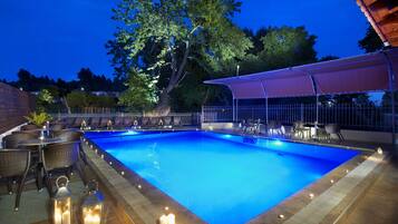 Outdoor pool, pool umbrellas, pool loungers