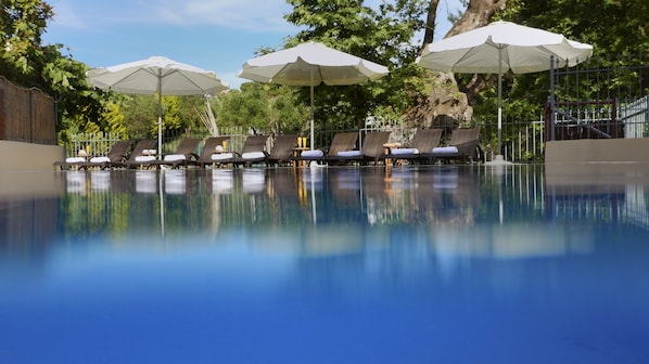 Outdoor pool, pool umbrellas, pool loungers
