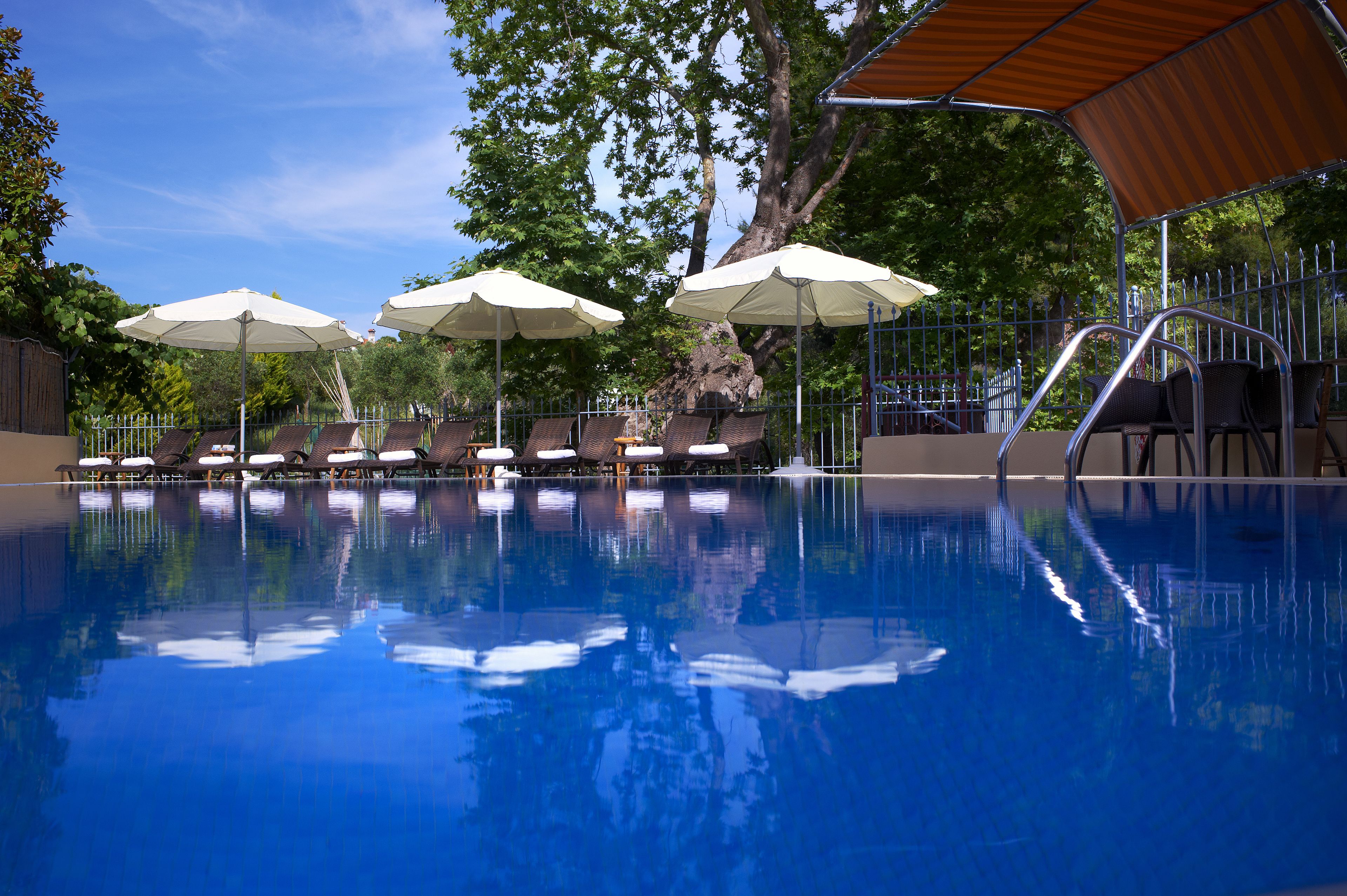 Outdoor pool, pool umbrellas, pool loungers