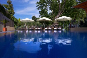 Outdoor pool, pool umbrellas, pool loungers