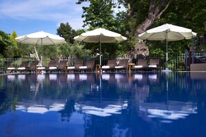 Outdoor pool, pool umbrellas, pool loungers