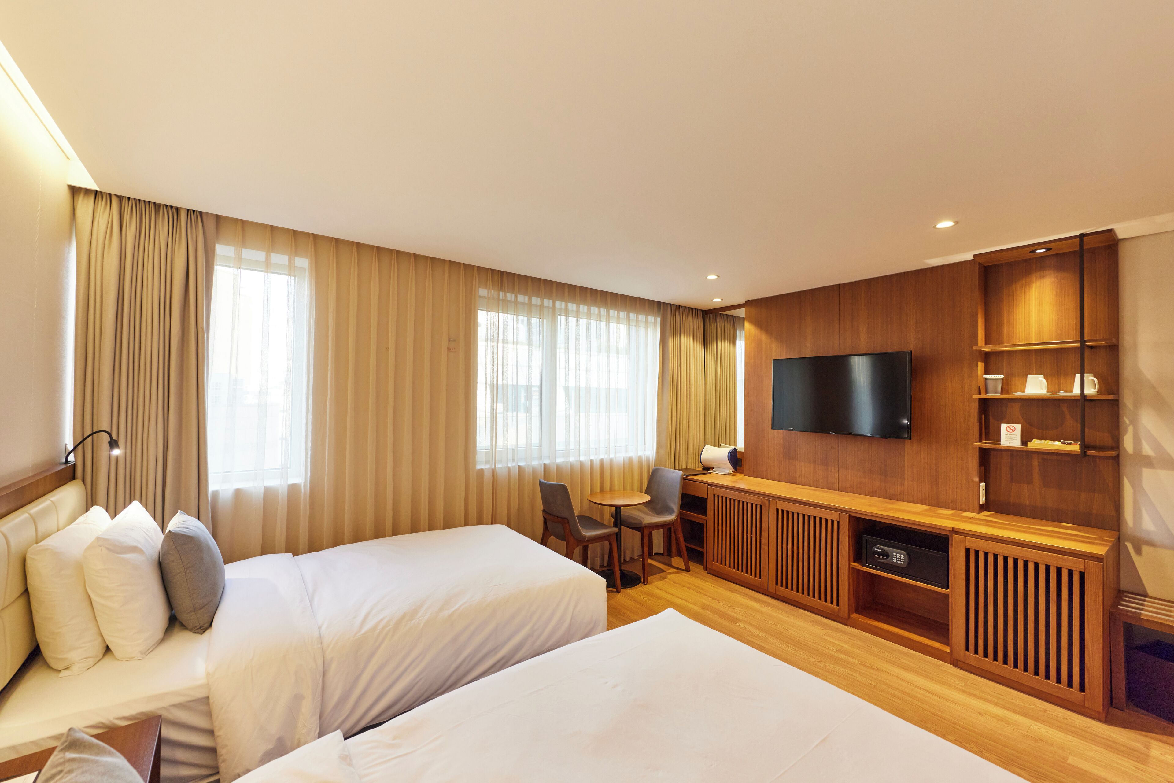 deluxe twin room | premium bedding, in-room safe, desk, blackout curtains