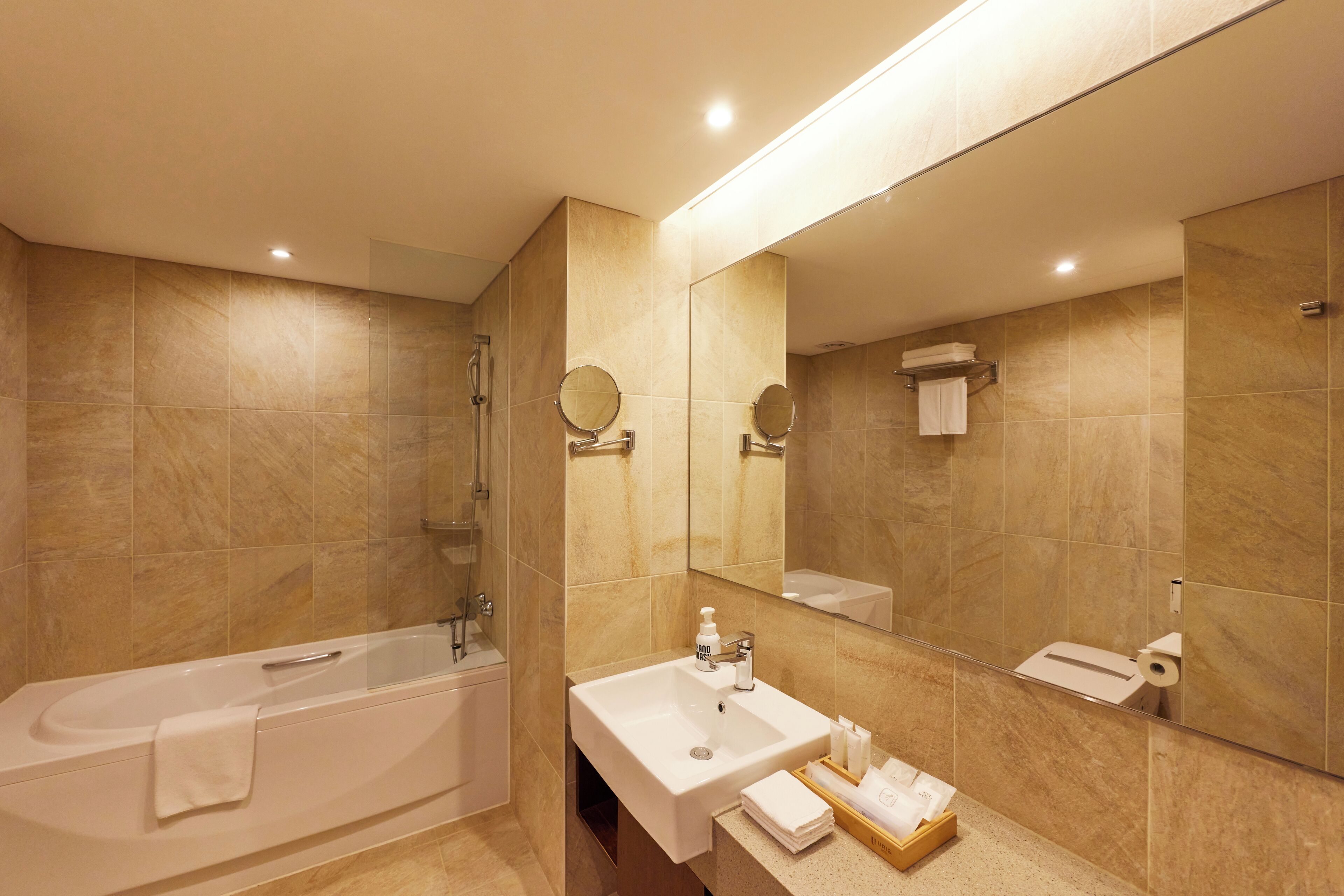 deluxe twin room | bathroom | hair dryer, bathrobes, bidet, towels