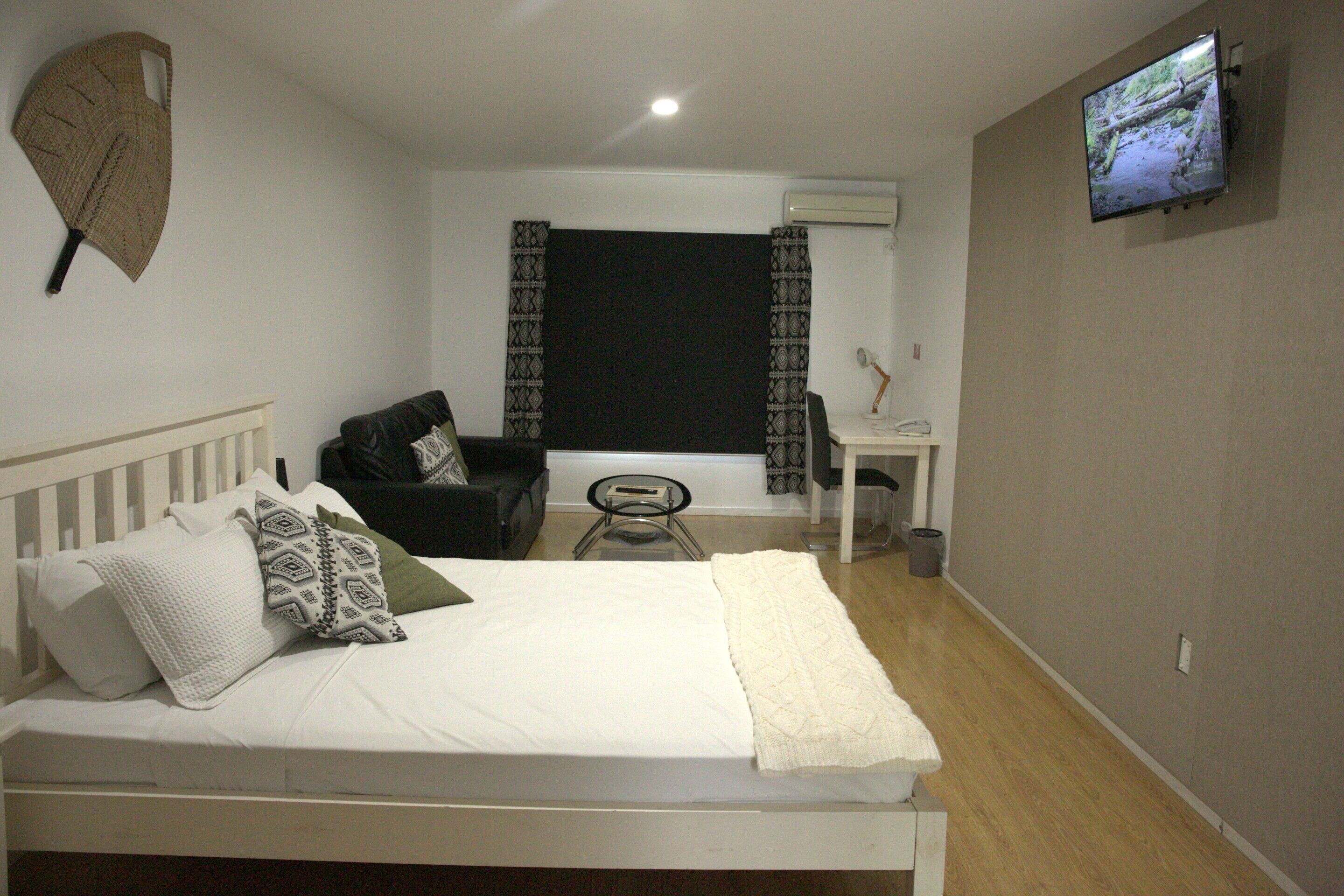 deluxe double room | in-room safe, desk, blackout curtains, soundproofing