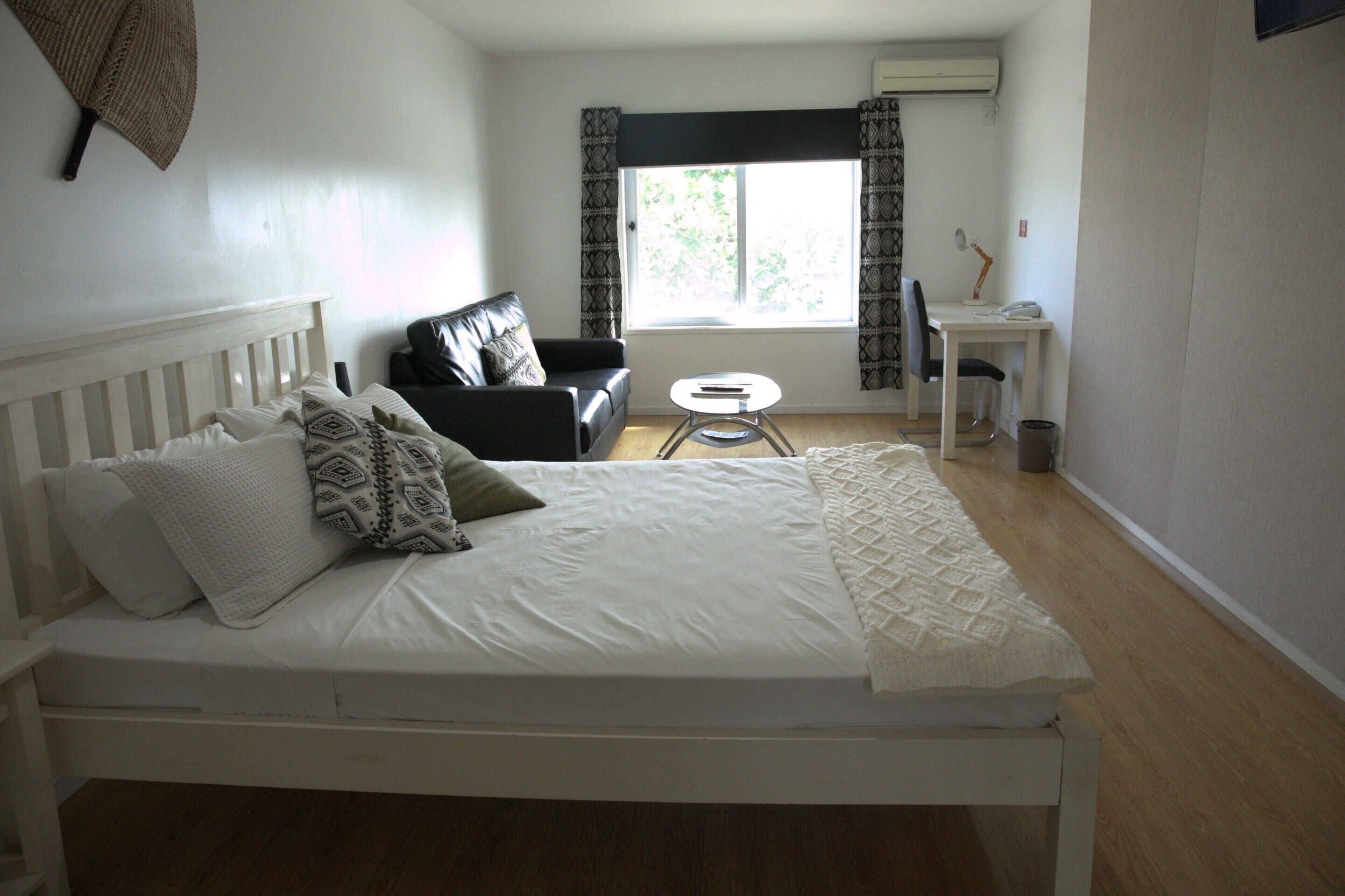 deluxe double room | in-room safe, desk, blackout curtains, soundproofing