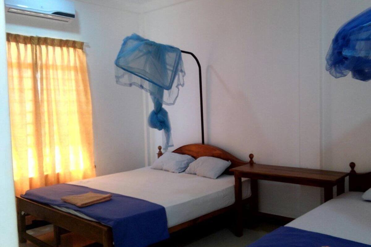 Basic Double or Twin Room, Garden View | Premium bedding, in-room safe, desk, iron/ironing board