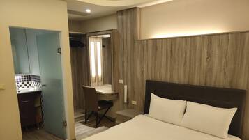 Desk, blackout curtains, free WiFi, bed sheets