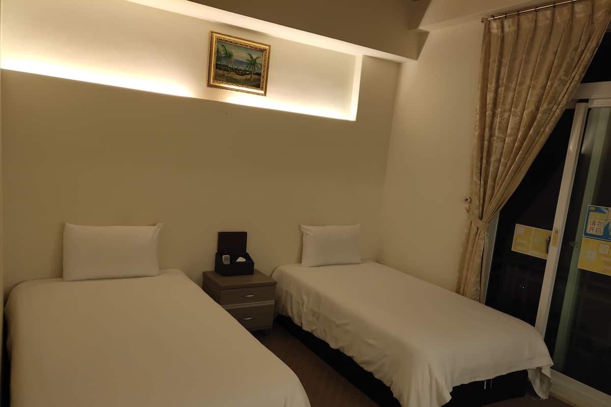 Twin kamer | Een bureau, verduisterende gordijnen, gratis wifi, beddengoed