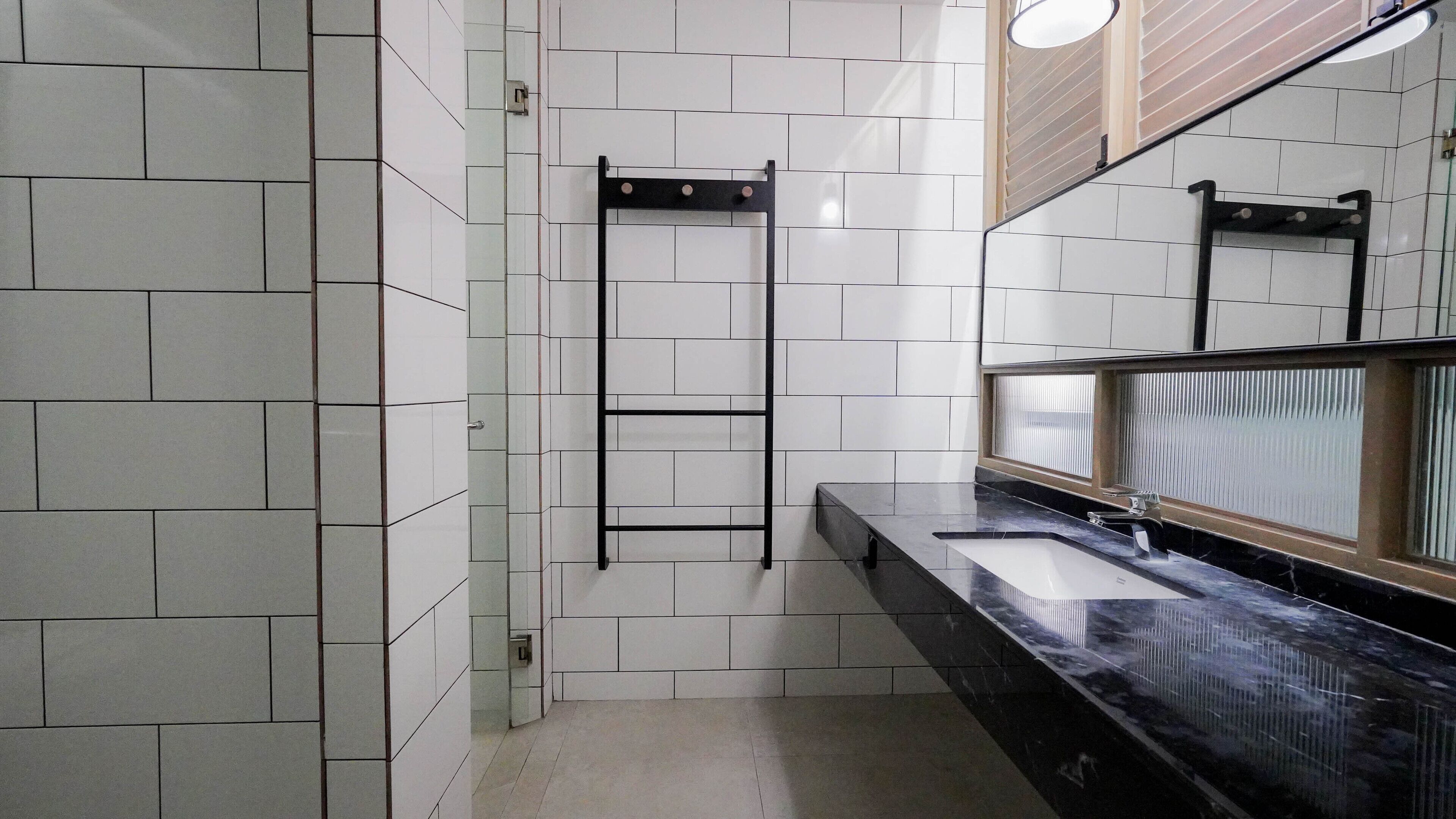 deluxe triple room | bathroom | shower, free toiletries, hair dryer, bathrobes