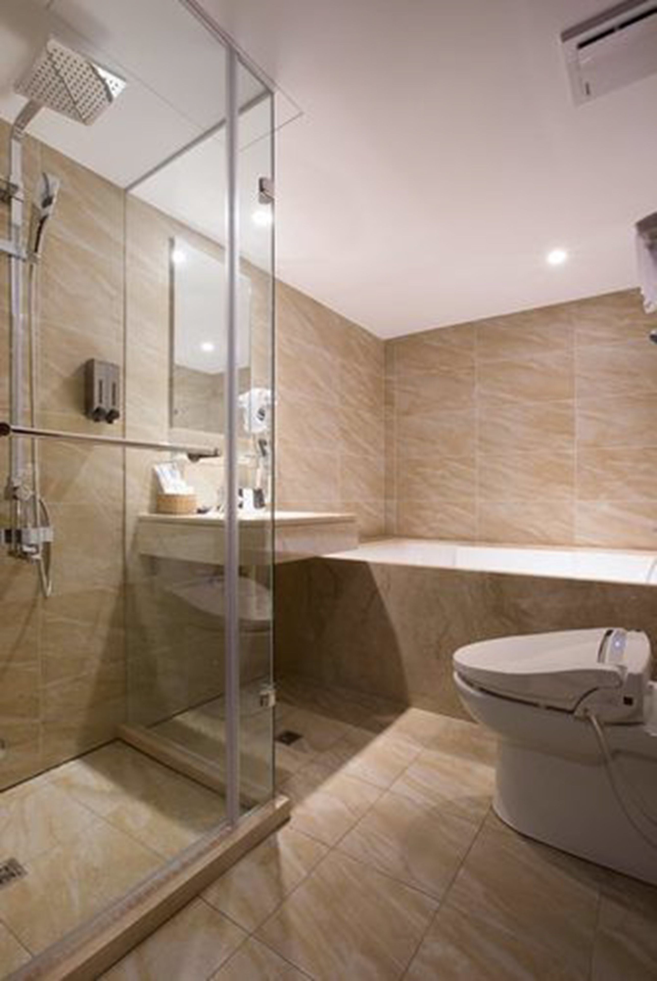 family triple room | bathroom | hair dryer, slippers, bidet, towels