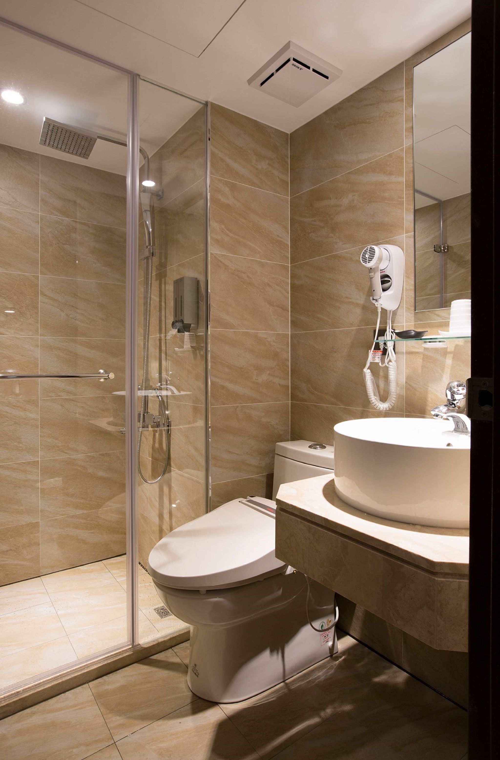 hair dryer, slippers, bidet, towels