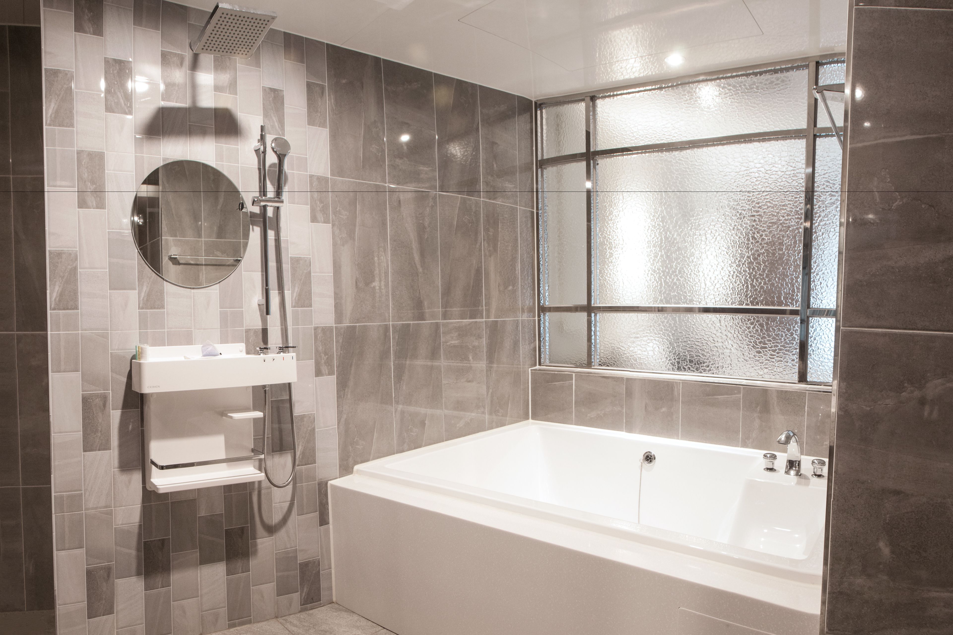 separate bathtub and shower, hair dryer, bathrobes, slippers