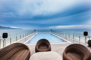 Outdoor pool, pool umbrellas, sun loungers