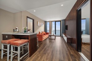2 bedrooms residence | Living area | 43-inch LCD TV with cable channels, TV - Yarra Ocean Suites Danang (Da Nang)