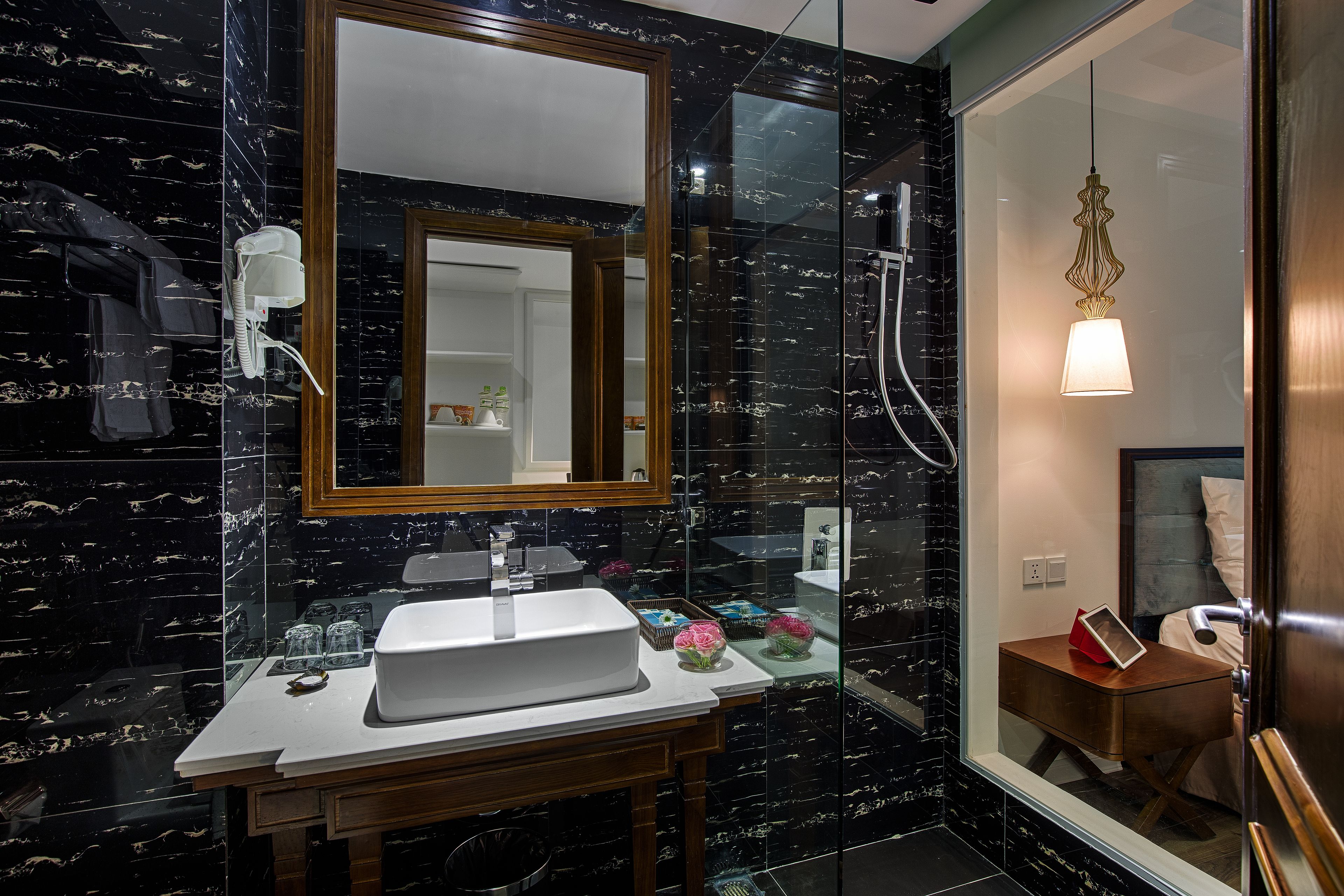 shower, rainfall showerhead, designer toiletries, hair dryer