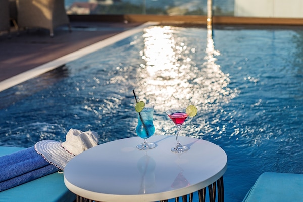 Outdoor pool, sun loungers