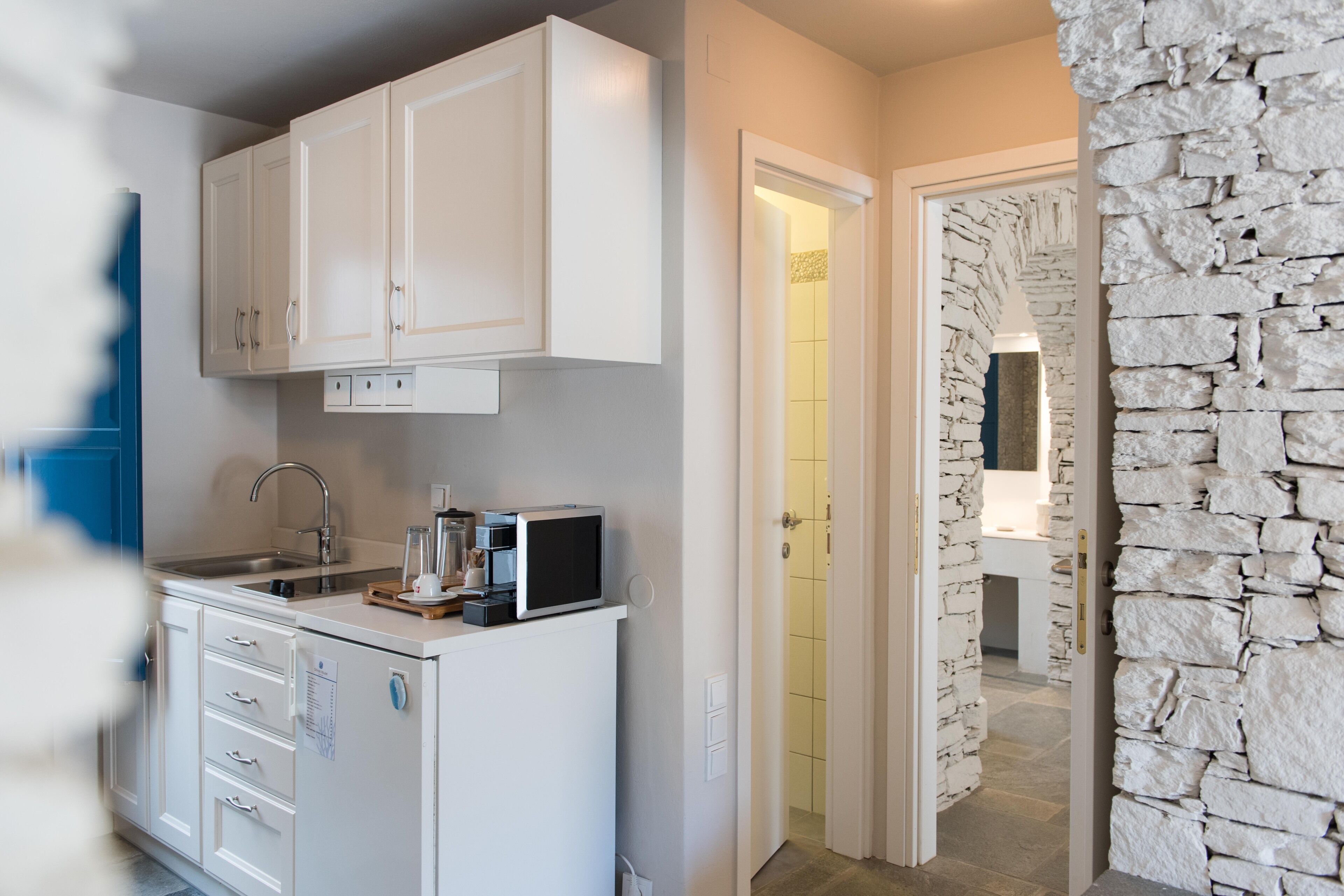 one bedroom suite with city view | private kitchenette | espresso maker, electric kettle, high chair