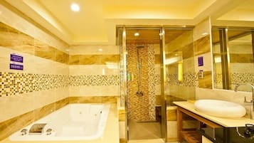 Separate tub and shower, jetted tub, free toiletries, hair dryer