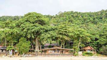 On the beach, sun-loungers, beach umbrellas, beach towels
